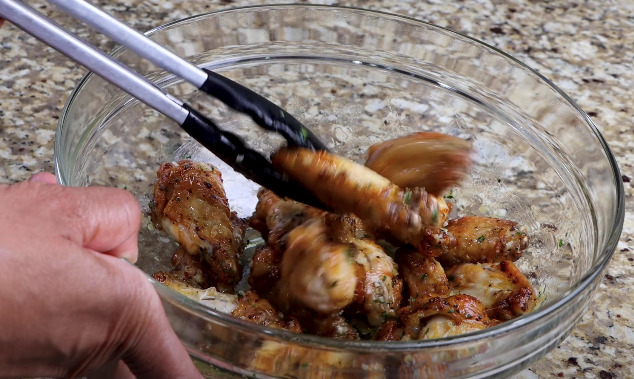 mixing the garlic parmesan wings